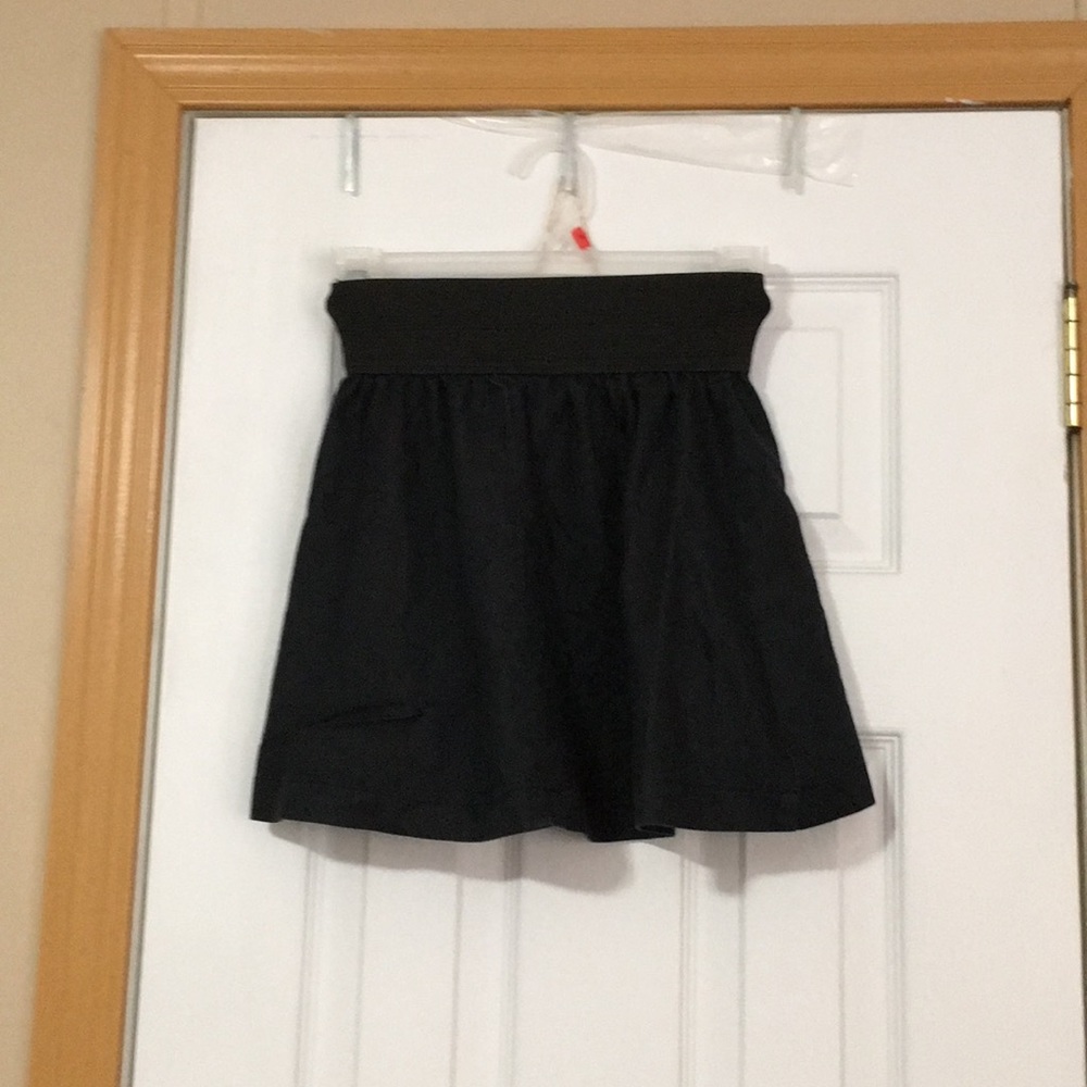 Miley Cyrus Max Azria all black skirt